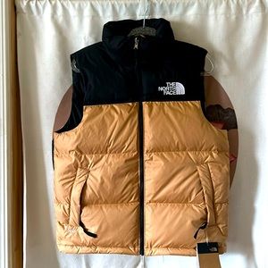 New, North face outerwear vest, brownish/gold and black, men’s size sm